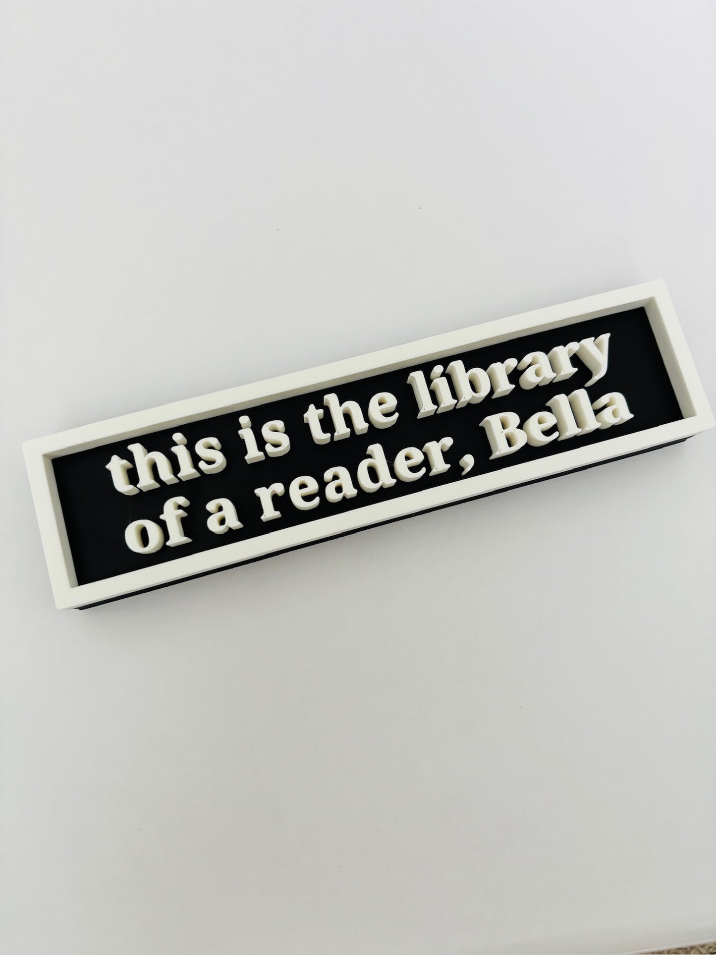 This is the Library of a Reader sign
