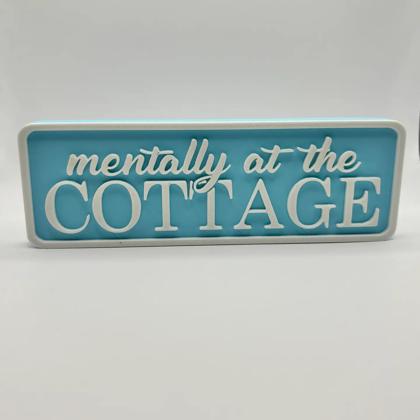 Mentally at the Cottage sign